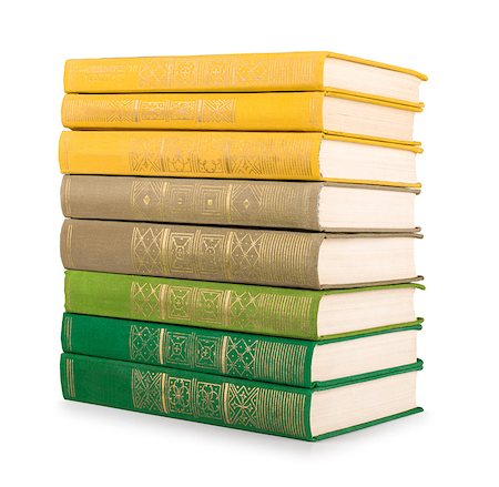 stack of vintage books in a green and yellow cover on a white background Photographie de stock - Aubaine LD & Abonnement, Code: 400-07916033