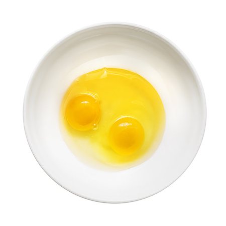 simsearch:825-03628867,k - Two raw eggs on white plate. Isolated on white. Stockbilder - Microstock & Abonnement, Bildnummer: 400-07916427
