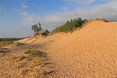 Sand dunes in Sleeping Bear National Park, along Lake Michigan in Glen Haven, Michigan, USA. Foto de stock - Super Valor sin royalties y Suscripción, Código: 400-07916531