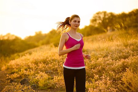 simsearch:6109-06004563,k - Young Beautiful Woman Running on the Mountain Trail in the Morning. Active Lifestyle Stockbilder - Microstock & Abonnement, Bildnummer: 400-07916710