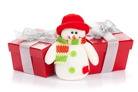 simsearch:400-07933751,k - Christmas gift boxes and snowman toy. Isolated on white background Photographie de stock - Aubaine LD & Abonnement, Code: 400-07917418