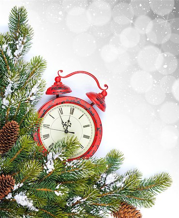 Christmas background with clock, snow fir tree and copy space with bokeh Stock Photo - Budget Royalty-Free & Subscription, Code: 400-07917442