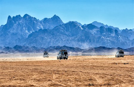 simsearch:400-08336472,k - Landscape of Sahara desert with jeeps for safari. Stock Photo - Budget Royalty-Free & Subscription, Code: 400-07917627