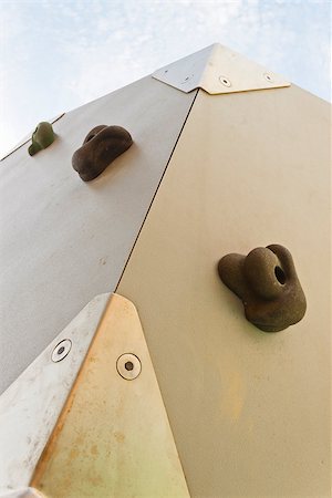 photojope (artist) - Detail of an outdoor artificial climbing wall with some holds Photographie de stock - Aubaine LD & Abonnement, Code: 400-07917634