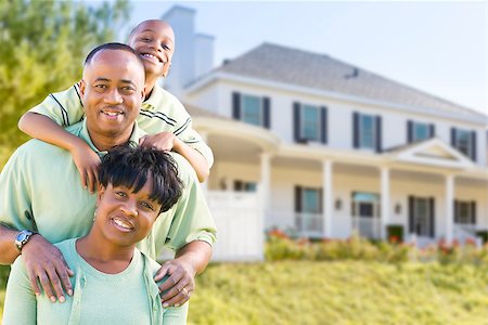 family house three people outdoors play - Happy Attractive African American Family in Front of Beautiful House. Stock Photo - Budget Royalty-Free & Subscription, Code: 400-07918591