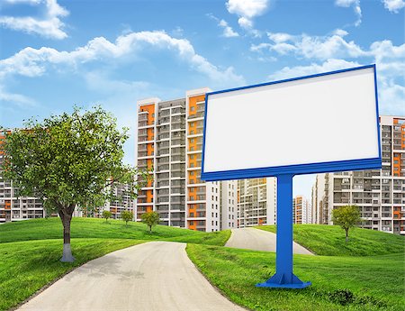 empty modern road - Tall buildings, green hills and road with large billboard against sky with clouds. Architectural concept Stock Photo - Budget Royalty-Free & Subscription, Code: 400-07919005