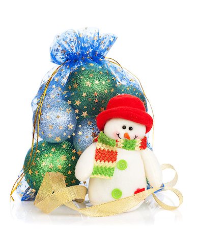 simsearch:400-07933751,k - Christmas bag with baubles and snowman. Isolated on white background Photographie de stock - Aubaine LD & Abonnement, Code: 400-07919358