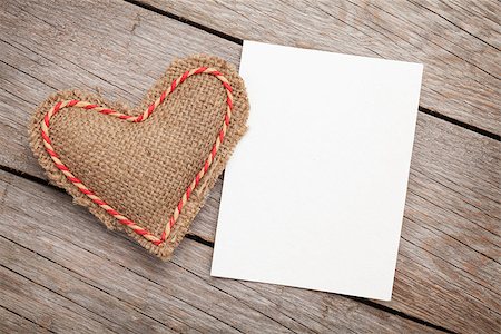 simsearch:400-07922855,k - Photo frame or greeting card and valentines day toy heart over wooden background Fotografie stock - Microstock e Abbonamento, Codice: 400-07919382