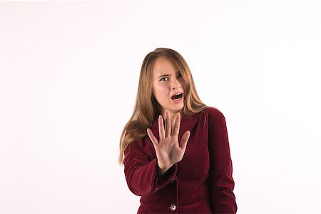 student scared - Serious woman making stop sign with his hand Foto de stock - Super Valor sin royalties y Suscripción, Código: 400-07924030