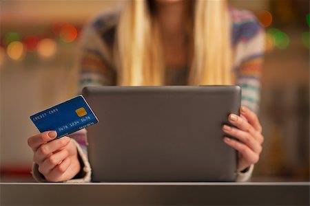 simsearch:400-06419734,k - Closeup on teenager girl with credit card using tablet pc Stock Photo - Budget Royalty-Free & Subscription, Code: 400-07924195