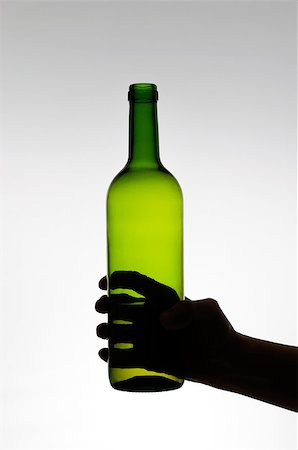 drinking wine people silhouette - Silhouette of a hand holding a green wine bottle Stock Photo - Budget Royalty-Free & Subscription, Code: 400-07924245