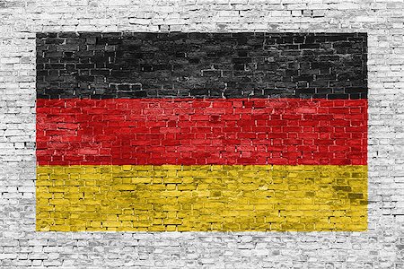 simsearch:400-07933897,k - German flag painted over white brick wall Fotografie stock - Microstock e Abbonamento, Codice: 400-07924632