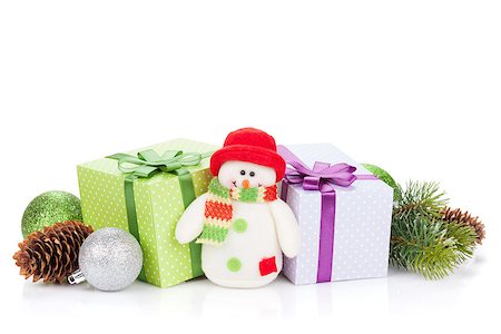 simsearch:400-07933751,k - Christmas gift boxes, decor and snowman toy. Isolated on white background Photographie de stock - Aubaine LD & Abonnement, Code: 400-07925275