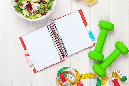 simsearch:400-07754604,k - Dumbells, tape measure, healthy food and notepad for copy space. Fitness and health Stock Photo - Budget Royalty-Free & Subscription, Code: 400-07925310