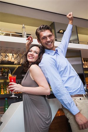 Happy friends dancing and smiling at the nightclub Stock Photo - Budget Royalty-Free & Subscription, Code: 400-07926628