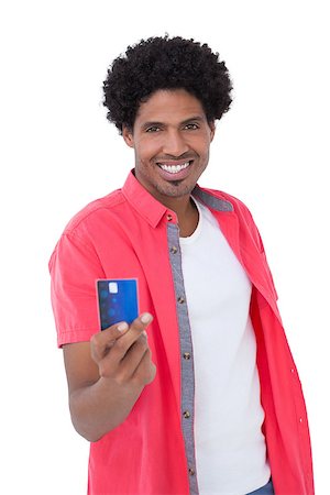 Happy man showing credit card on white background Stock Photo - Budget Royalty-Free & Subscription, Code: 400-07926861