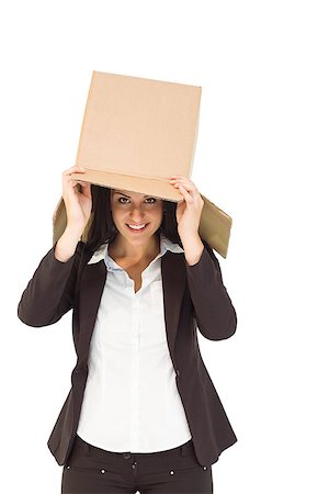 Businesswoman lifting box off head on white background Stock Photo - Budget Royalty-Free & Subscription, Code: 400-07926914