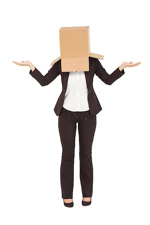 Businesswoman shrugging shoulders with box over head on white background Stock Photo - Budget Royalty-Free & Subscription, Code: 400-07926911
