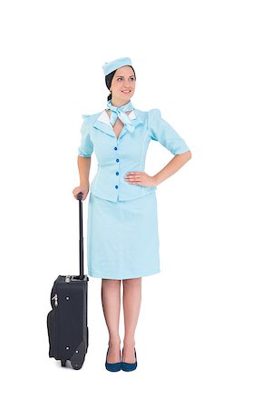 simsearch:400-07752842,k - Pretty air hostess holding suitcase on white background Stock Photo - Budget Royalty-Free & Subscription, Code: 400-07926932