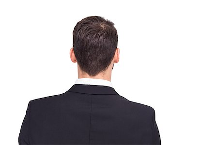 simsearch:400-08076534,k - Rear view of businessman in suit standing on white background Foto de stock - Royalty-Free Super Valor e Assinatura, Número: 400-07927305