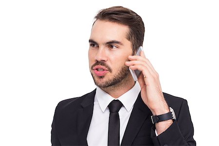 simsearch:400-07927298,k - Smart businessman speaking on the phone on white background Foto de stock - Royalty-Free Super Valor e Assinatura, Número: 400-07927300