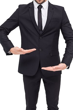 simsearch:400-04861869,k - Businessman presenting something with his hands on white background Foto de stock - Royalty-Free Super Valor e Assinatura, Número: 400-07927346