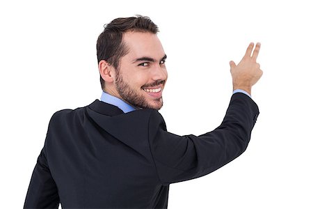 simsearch:400-04861869,k - Smiling businessman pointing these fingers on white background Foto de stock - Royalty-Free Super Valor e Assinatura, Número: 400-07927456