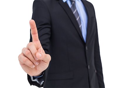 simsearch:400-04861869,k - Mid section of businessman pointing something up on white background Foto de stock - Royalty-Free Super Valor e Assinatura, Número: 400-07927460