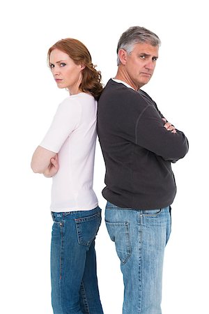 Casual couple not speaking after fight on white background Stock Photo - Budget Royalty-Free & Subscription, Code: 400-07927582