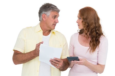 simsearch:400-07778671,k - Casual couples working out their bills on white background Fotografie stock - Microstock e Abbonamento, Codice: 400-07927614