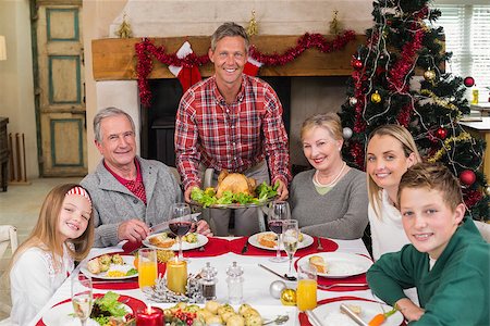 simsearch:400-06871551,k - Man serving roast turkey at christmas at home in the living room Stock Photo - Budget Royalty-Free & Subscription, Code: 400-07928261