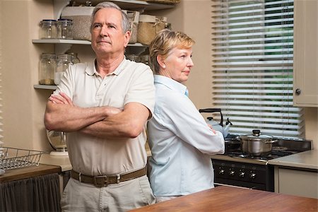 simsearch:400-05089878,k - Senior couple having an argument at home in the kitchen Stock Photo - Budget Royalty-Free & Subscription, Code: 400-07928426