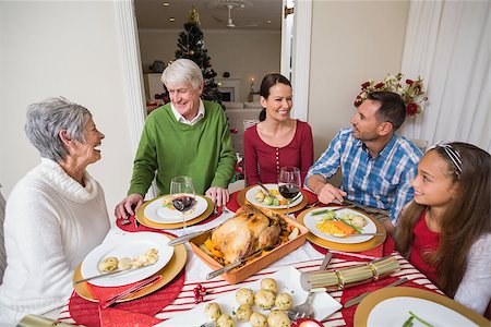 simsearch:400-07929054,k - Portrait of smiling family at christmas at home in the living room Stock Photo - Budget Royalty-Free & Subscription, Code: 400-07929018