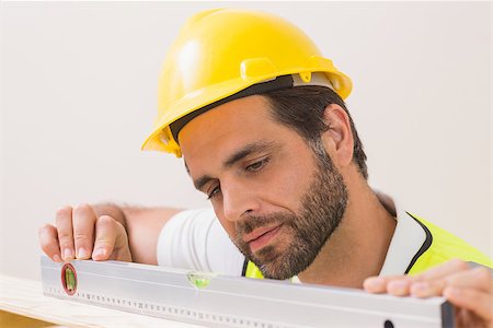 simsearch:400-07929714,k - Construction worker using spirit level in a new house Stock Photo - Budget Royalty-Free & Subscription, Code: 400-07929319