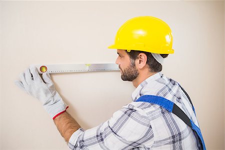 simsearch:400-07929714,k - Construction worker using spirit level in a new house Stock Photo - Budget Royalty-Free & Subscription, Code: 400-07929514