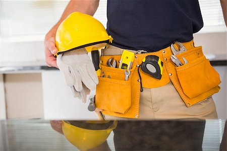 simsearch:400-07929714,k - Close up of man with tool belt in a new house Stock Photo - Budget Royalty-Free & Subscription, Code: 400-07929708