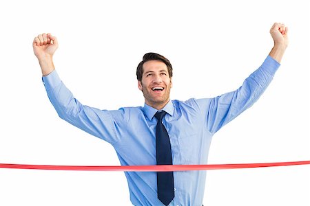 Happy businessman crossing finishing line on white background Stock Photo - Budget Royalty-Free & Subscription, Code: 400-07929923