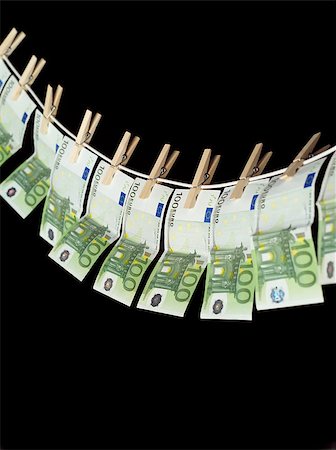 simsearch:693-06021294,k - Laundering money towards black background Stockbilder - Microstock & Abonnement, Bildnummer: 400-07920375