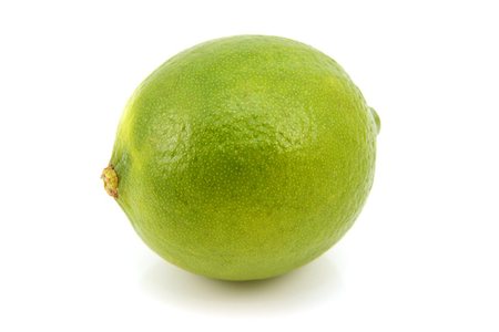 simsearch:6113-07565172,k - Ripe green lime, isolated on a white background Stock Photo - Budget Royalty-Free & Subscription, Code: 400-07920636