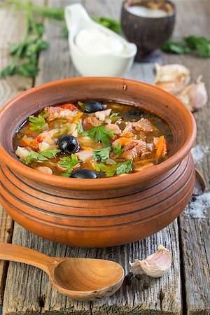 pickled lemon - Traditional meat soup in a ceramic pot on old table. Stock Photo - Budget Royalty-Free & Subscription, Code: 400-07920855