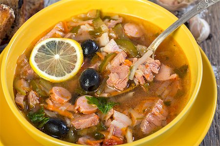 pickled lemon - Meat soup in a bowl on old wooden table closeup. Stock Photo - Budget Royalty-Free & Subscription, Code: 400-07920858