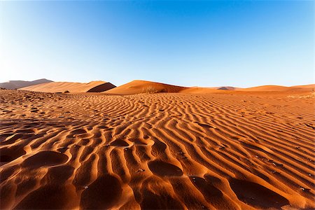 Landscape of dunes in sossusvlei with  wind shapes the sand dunes, Namibia Photographie de stock - Aubaine LD & Abonnement, Code: 400-07921180