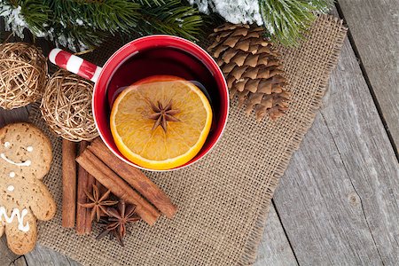 Christmas mulled wine with fir tree, gingerbread and spices on wooden table Stock Photo - Budget Royalty-Free & Subscription, Code: 400-07921362