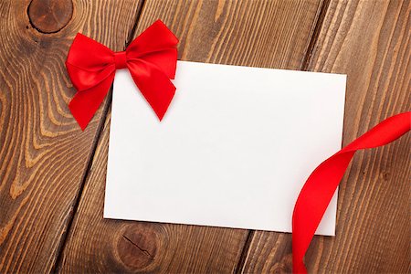 simsearch:400-07922855,k - Valentines day greeting card with red ribbon over wooden background Foto de stock - Super Valor sin royalties y Suscripción, Código: 400-07921414