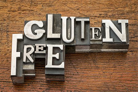 gluten free words  in vintage metal type printing blocks over grunge wood - nutrition concept Stock Photo - Budget Royalty-Free & Subscription, Code: 400-07921727