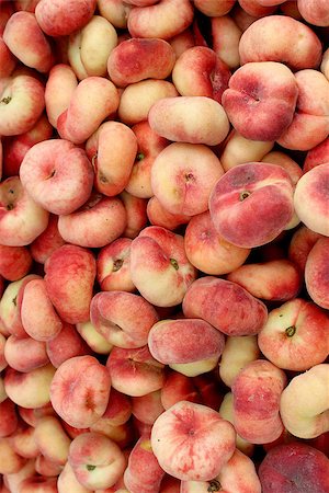 Fresh organic donut peaches background, photo taken at local farmers market, in New York City Stock Photo - Budget Royalty-Free & Subscription, Code: 400-07922126