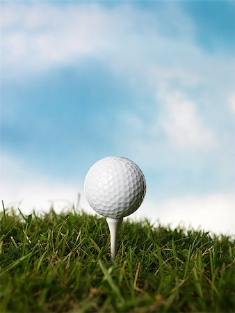 Golfball on a peg in the grass Stock Photo - Budget Royalty-Free & Subscription, Code: 400-07922182