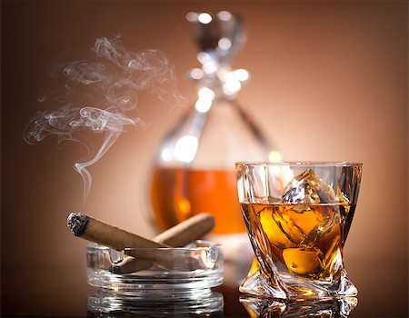 Glass of whiskey and a cigar in vintage style Stock Photo - Budget Royalty-Free & Subscription, Code: 400-07922363