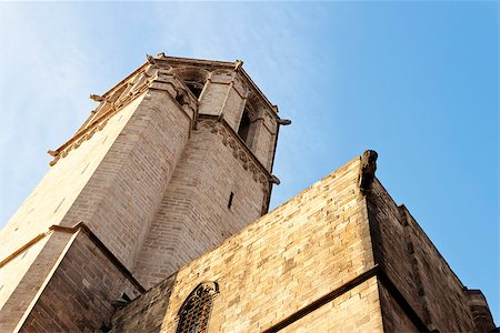 photojope (artist) - Santa Eulalia gothic Cathedral back view of a tower and gargoyles in Barcelona, Catalonia, Spain. Fotografie stock - Microstock e Abbonamento, Codice: 400-07922451