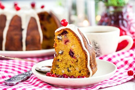 Piece of holiday bundt cake decorated with icing and cranberr Stock Photo - Budget Royalty-Free & Subscription, Code: 400-07922574